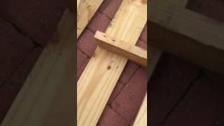 Stripping pallet wood with a Mattock