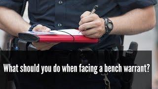 What should you do when facing a bench warrant?