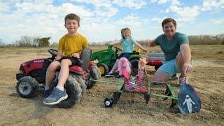 Using kids tractors to dig up hidden toys  Tractors for kids
