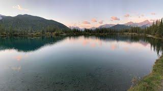 Solo car camping with beautiful dawn at pond