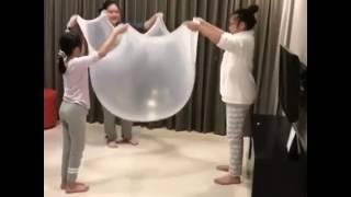 Girls Make Giant Bubble with Slime