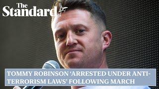 Tommy Robinson arrested under anti-terrorism laws following London march