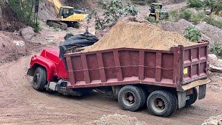 Pozzolan Mining - Overload Trucks Leaving the Quarry. E8S2