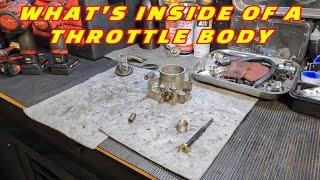 WHATS INSIDE A THROTTLE BODY LETS TEAR IT DOWN AND SEE WHATS INSIDE