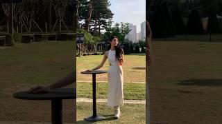 Woman in White Silk Dress