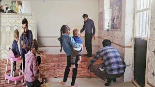 Carpeting the house The family carpets the home for a new beginning.