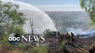 Extreme red flag warning issued as fires rage in California