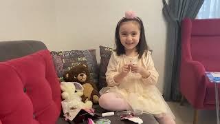 Princess Miray trying lip balm in her first video 
