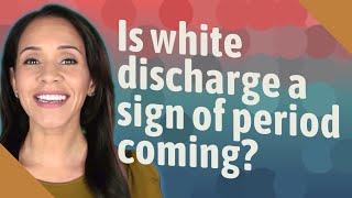 Is white discharge a sign of period coming?