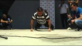 Most knuckle push-ups carrying 40 kg pack in one minute - George Matureli Front view