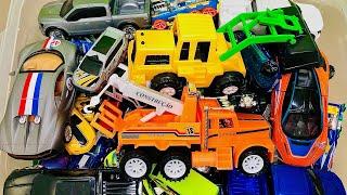 Box with toys  Cars  Truck  Tractor