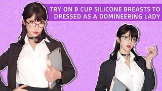 Try on B cup silicone breasts to dressed as a domineering lady