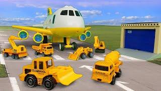 Das Spielzeug-Flugzeug bringt die Helfer Autos zu ihren Arbeitsplätzen. Video für Kinder