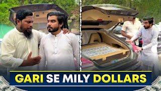 Gari ki diggy se nikaly dollars 