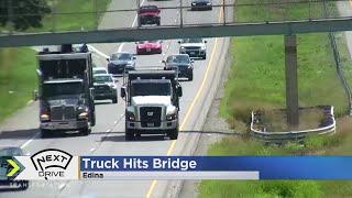 MnDOT video shows truck hitting pedestrian bridge over Highway 62