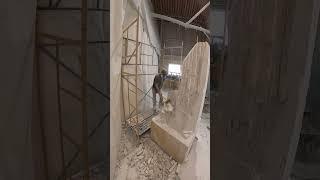 Creating the form of the sculpture which is somewhere inside this massive block of marble #sculpture