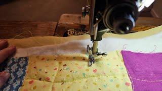 Free motion quilting on Vintage Singer 99K. Baby quilt for Project Linus. #quilting #recycling