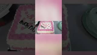 Birthday cream cake in pink and white colour