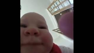 Baby eating camera meme Original