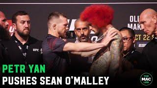 Petr Yan shoves Sean OMalley during First Face Off  UFC 280 Press Conference