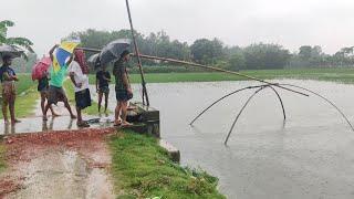 Amazing rainy day fishing video  Catching fish in flood water  Best village fishing