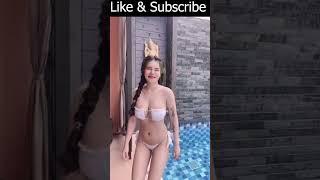 Sexy Asian Girl Dancing In Bikini Near The Swimming Pool