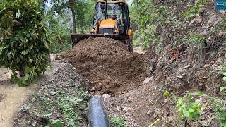 Cutting Out the Hillside and Burying Mountain Farmers Canal Pipe to Widen Narrow Road