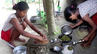 santhali tribe girl village cooking in traditional style of eating food  - rural lifestyle