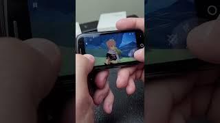 play Genshin Impact on a 2 inch smartphone? Ok  #shorts