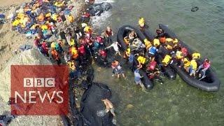 Drone video shows migrants arrival - BBC News