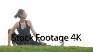 Girl performs yoga in park