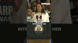 See Harris reaction to hecklers interrupting her speech