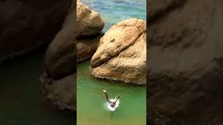 “ Cliff Dive Spectacle Defying Gravity with Daring Leaps  #AdventureTime #DaredevilDives”