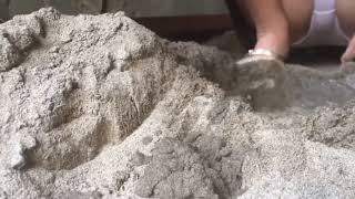 beautiful single mom play sand