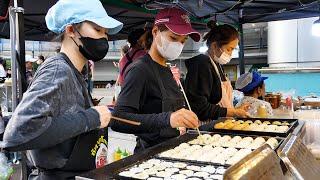 Hardworking mother and two daughters   $0.12 takoyaki  thai street food