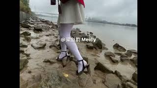 Mud heels and white tights on the river bank