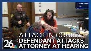 Lawyer attacked Murder defendant attacks her own attorney in court