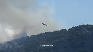 Hellenic Air Force pair of CL 415 water drops in west Chios island.