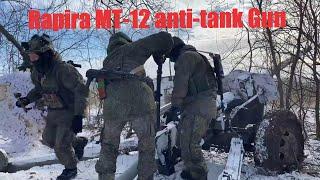 Russian soldiers fire pratically obselete Soviet Rapira anti-tank guns