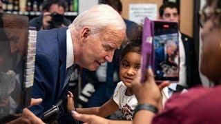 ‘Really creepy’ Joe Biden appears to sniff a child during a surprise visit