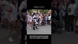 Kevin Piette Carried the Olympic Torch Via a Robotic Exoskeleton #paris2024 #Olympics  #kevinpiette