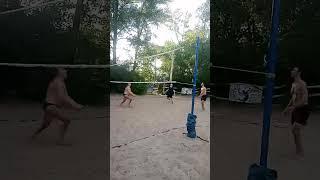 Beach volleyball successful block of the ball.