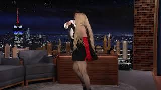 Madonna crawls on Jimmy Fallons desk in Tonight Show interview