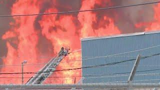 Neighbors react to large Kansas City warehouse fire