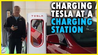 Charging a Tesla at a Charging Station  How To Charge A Tesla