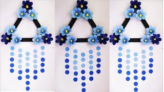 blue colour paper flower wallhanging craft for wall decoration paper craft  wallmate easy craft