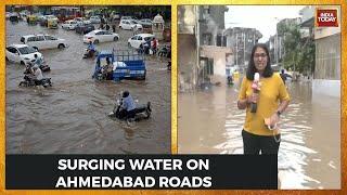 Watch Ground Report From Ahmedabad First Floors Of Buildings Cars Submerged  Gujarat Rain News