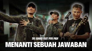 MENANTI SEBUAH JAWABAN - TRI SUAKA FT. PIYU PADI OFFICIAL LIVE MUSIC VIDEO