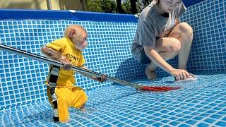 Bibi enlisted with Mom to clean the pool when it was sunny