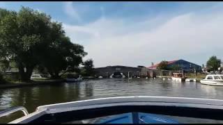 boat stuck under potter Heigham bridge